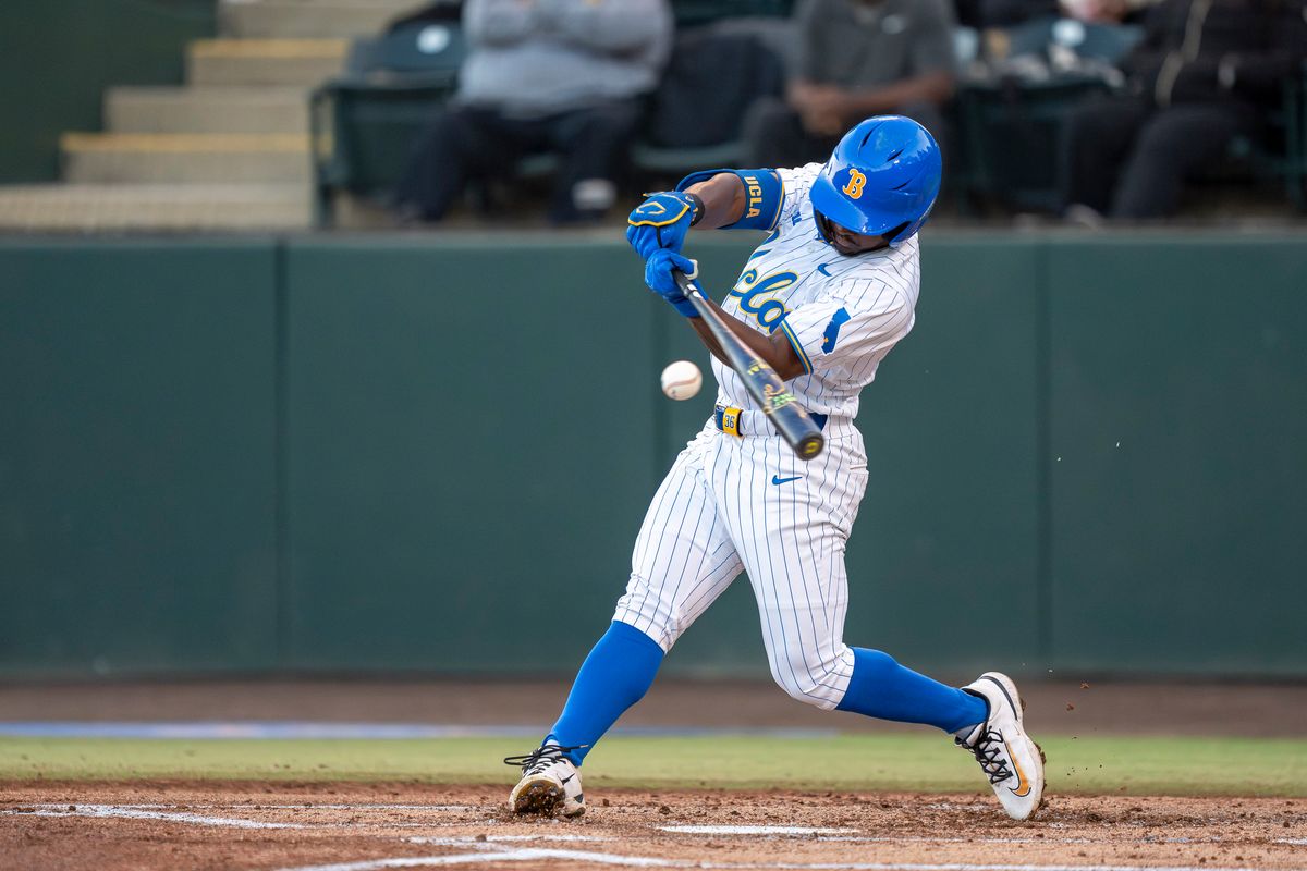 UCLA outfielder, Dean West (36) at bat, hitting a ball during a NCAA baseball game against UC San Diego on February 13, 2026 at Jackie Robinson Stadium in Los Angeles, CA.