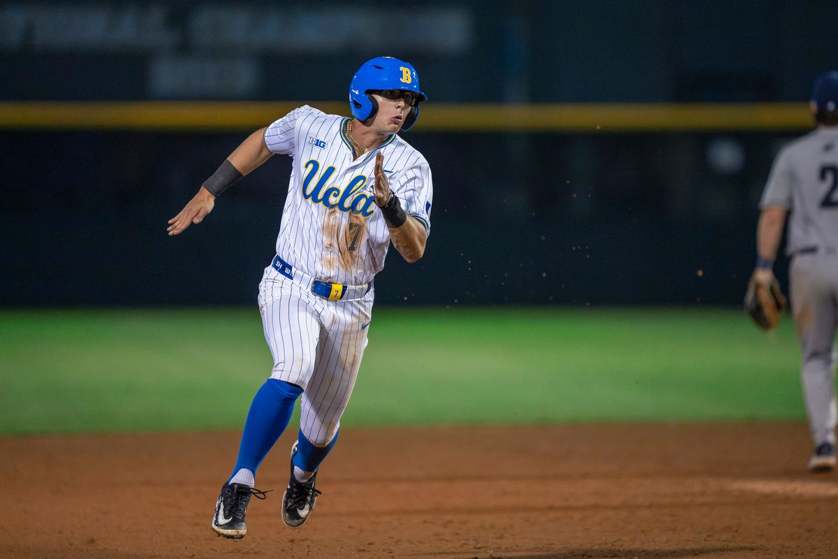 UCLA infielder, Roman Martin (7) running for third base after a teammate's hit during a NCAA baseball game against UC San Diego on February 13, 2026 at Jackie Robinson Stadium in Los Angeles, CA.