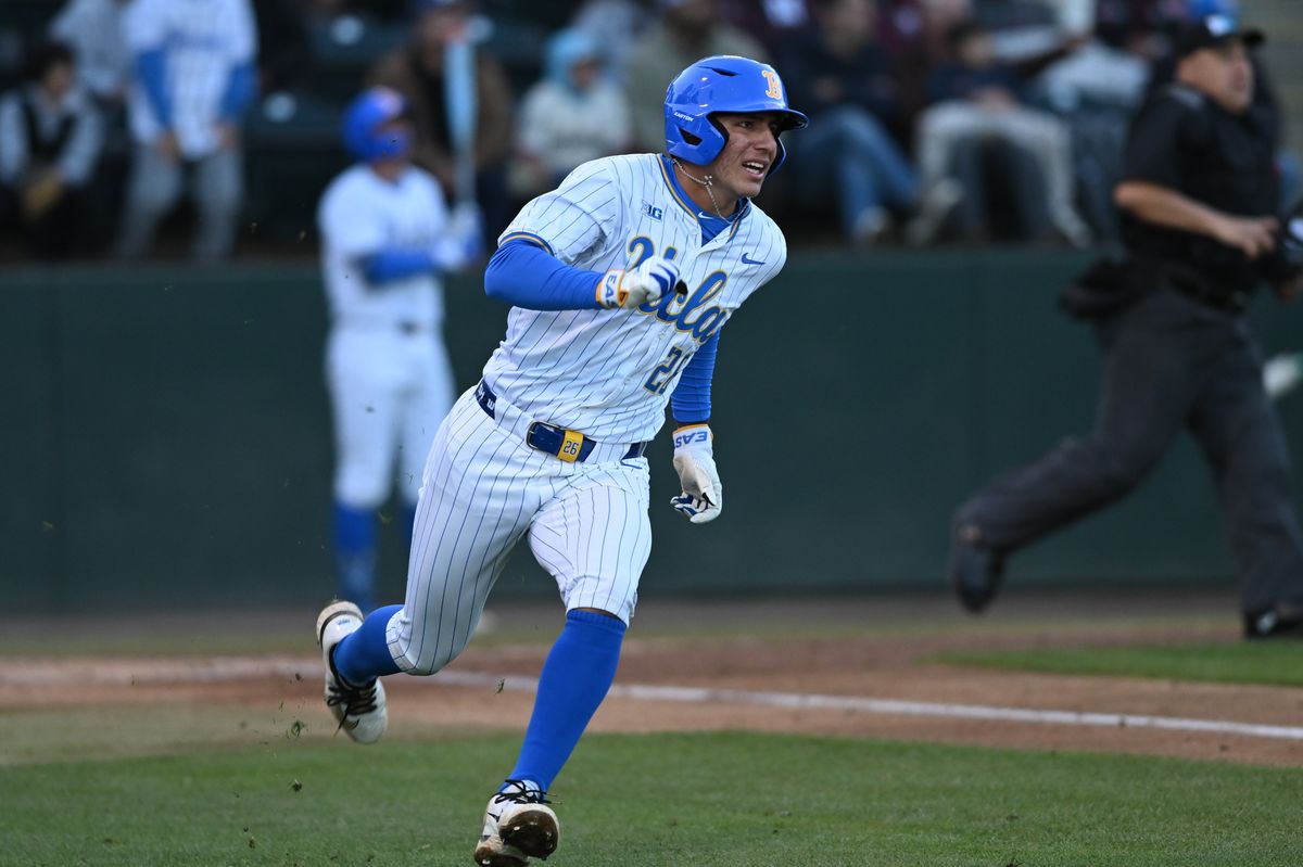 UCLA infielder Aiden Aguayo (26) sprints to first base after making contact during a game between TCU and UCLA on Friday, February 20,2026 at Jackie Robinson Stadium in Los Angeles Calif