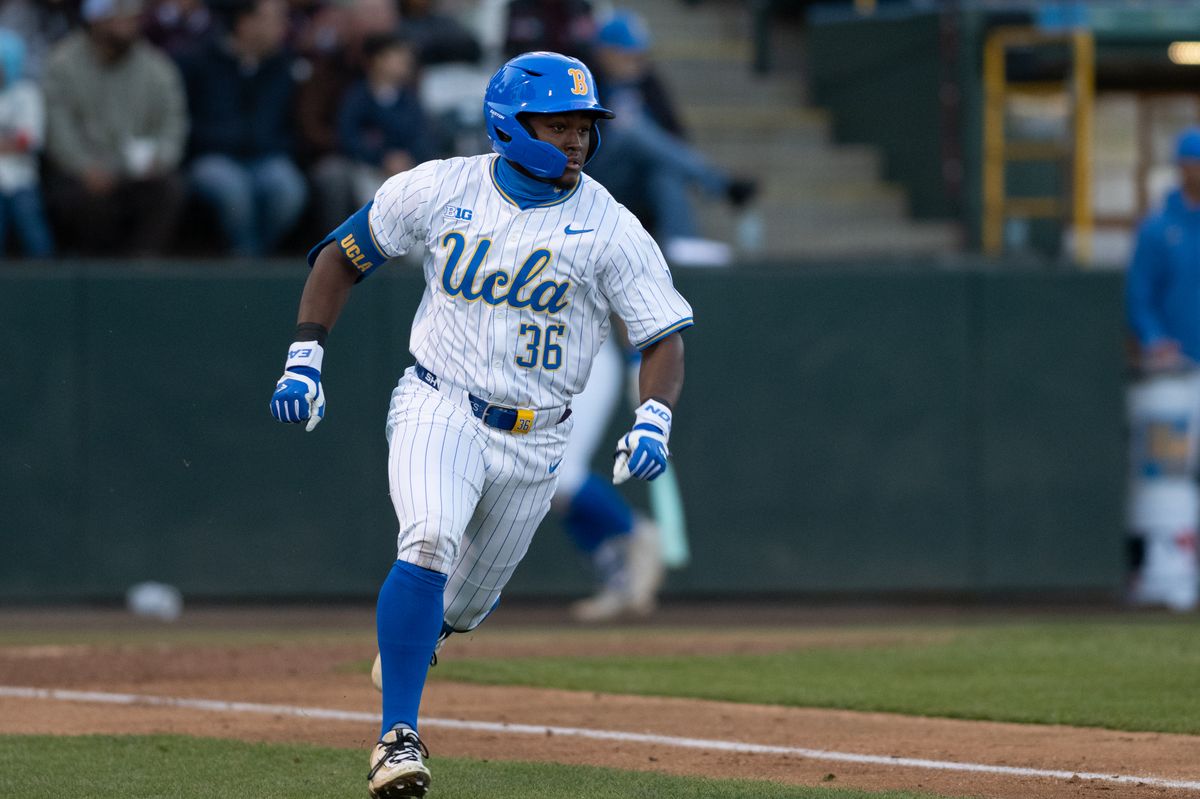 UCLA outfielder Dean West (36) sprints to first base during a game between TCU and UCLA on Friday, February 20,2026 at Jackie Robinson Stadium in Los Angeles Calif