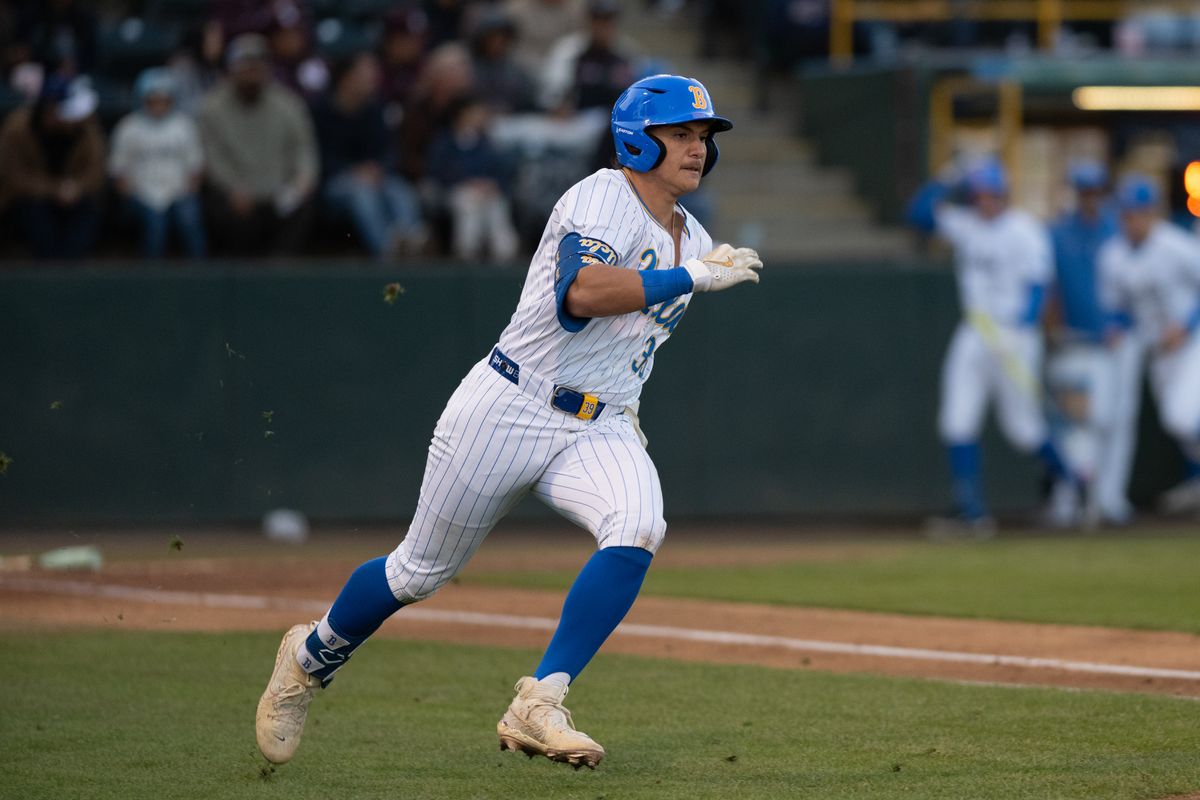 UCLA first base Mulivai Levu (39) sprints to first base after putting the ball in play during a game between TCU and UCLA on Friday, February 20,2026 at Jackie Robinson Stadium in Los Angeles Calif