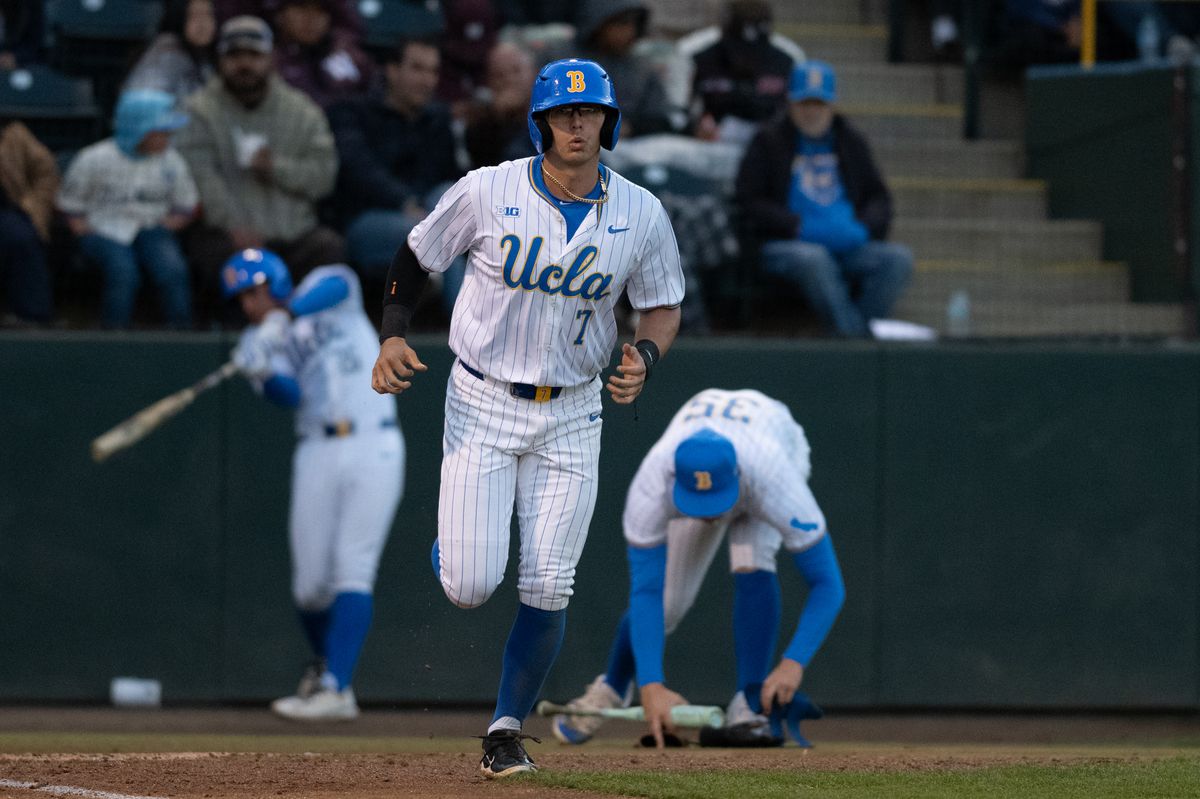 UCLA third base Roman Martin (7) heads to first base after ball four during a game between TCU and UCLA on Friday, February 20,2026 at Jackie Robinson Stadium in Los Angeles Calif