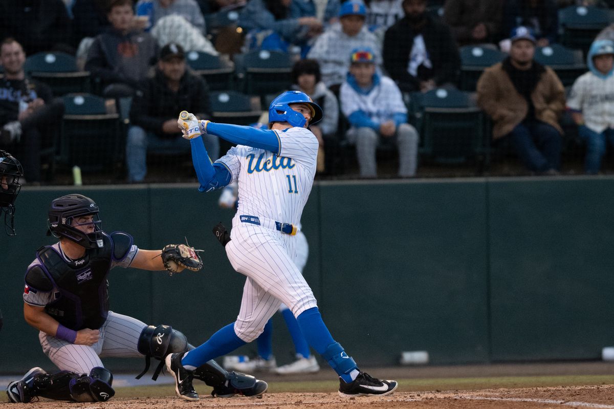 UCLA outfielder Payton Brennan (11) swings and misses during a game between TCU and UCLA on Friday, February 20,2026 at Jackie Robinson Stadium in Los Angeles Calif