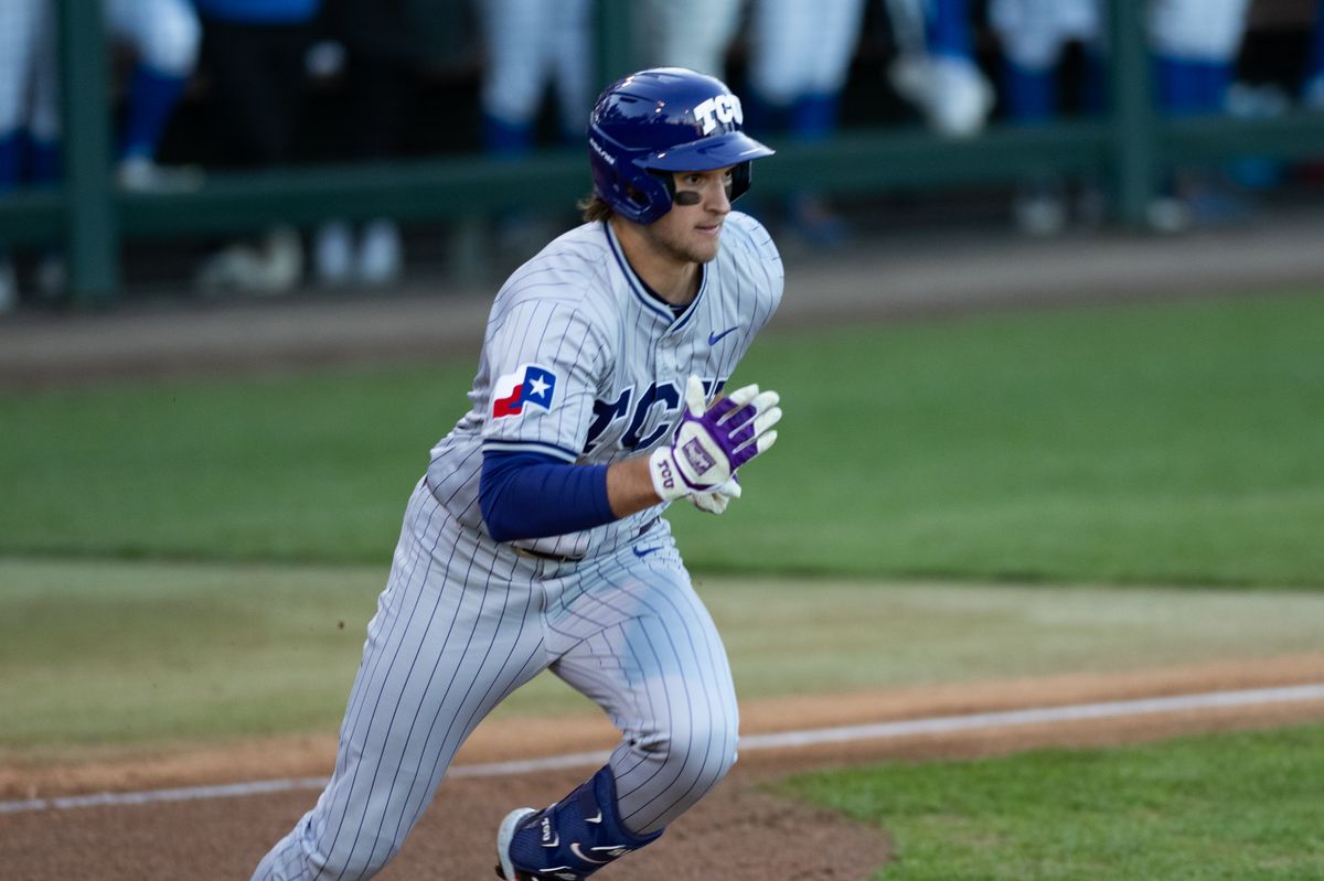 TCU outfielder Chase Brunson (15) sprints to first base after hitting the ball during a game between TCU and UCLA on Friday, February 20,2026 at Jackie Robinson Stadium in Los Angeles Calif