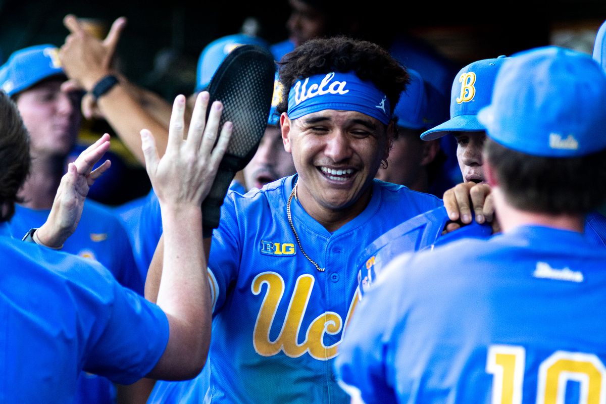 UCLA infielder, Mulivai Levu (39) celebrates after scoring during an NCAA baseball game against USC on April 4th, 2026 at Jackie Robinson Stadium in Los Angeles, CA.
