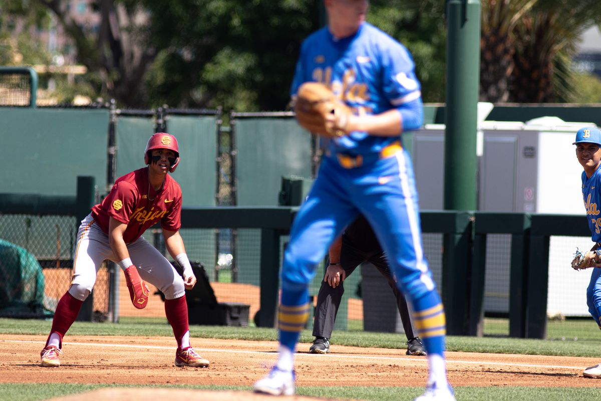 USC infielder, Adrian Lopez (5) takes a lead off first during an NCAA baseball against UCLA on April 4th, 2026 at Jackie Robinson Stadium in Los Angeles, CA.