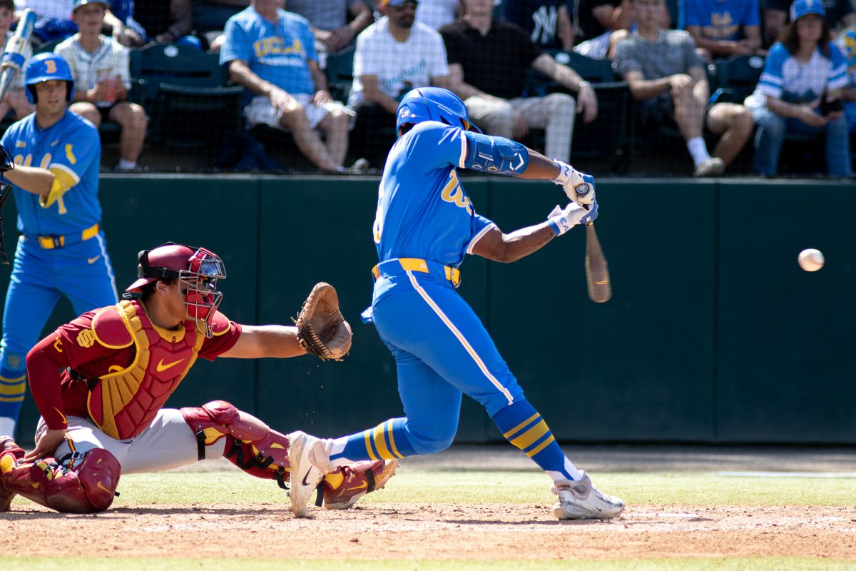 UCLA Outfielder, Dean West (36) at bat, mid hit during an NCAA baseball game against USC on April 4th, 2026 at Jackie Robinson Stadium in Los Angeles, CA.