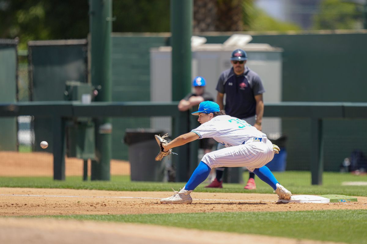 UCLA infielder Mulivai Levu (39) fielding a throw from outfield for an out during a NCAA baseball game against Saint Mary’s on May 29, 2026 at Jackie Robinson Stadium in Los Angeles, CA. UCLA infielder Mulivai Levu (39) fielding a throw from outfield for an out during a NCAA baseball game against Saint Mary’s on May 29, 2026 at Jackie Robinson Stadium in Los Angeles, CA.