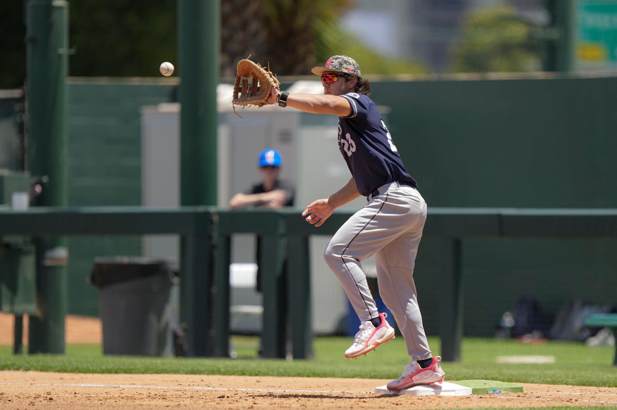 Saint Mary’s infielder Makoa Sniffen (23) fielding a throw to first for an out during a NCAA baseball game against UCLA on May 29, 2026 at Jackie Robinson Stadium in Los Angeles, CA. Saint Mary’s infielder Makoa Sniffen (23) fielding a throw to first for an out during a NCAA baseball game against UCLA on May 29, 2026 at Jackie Robinson Stadium in Los Angeles, CA.