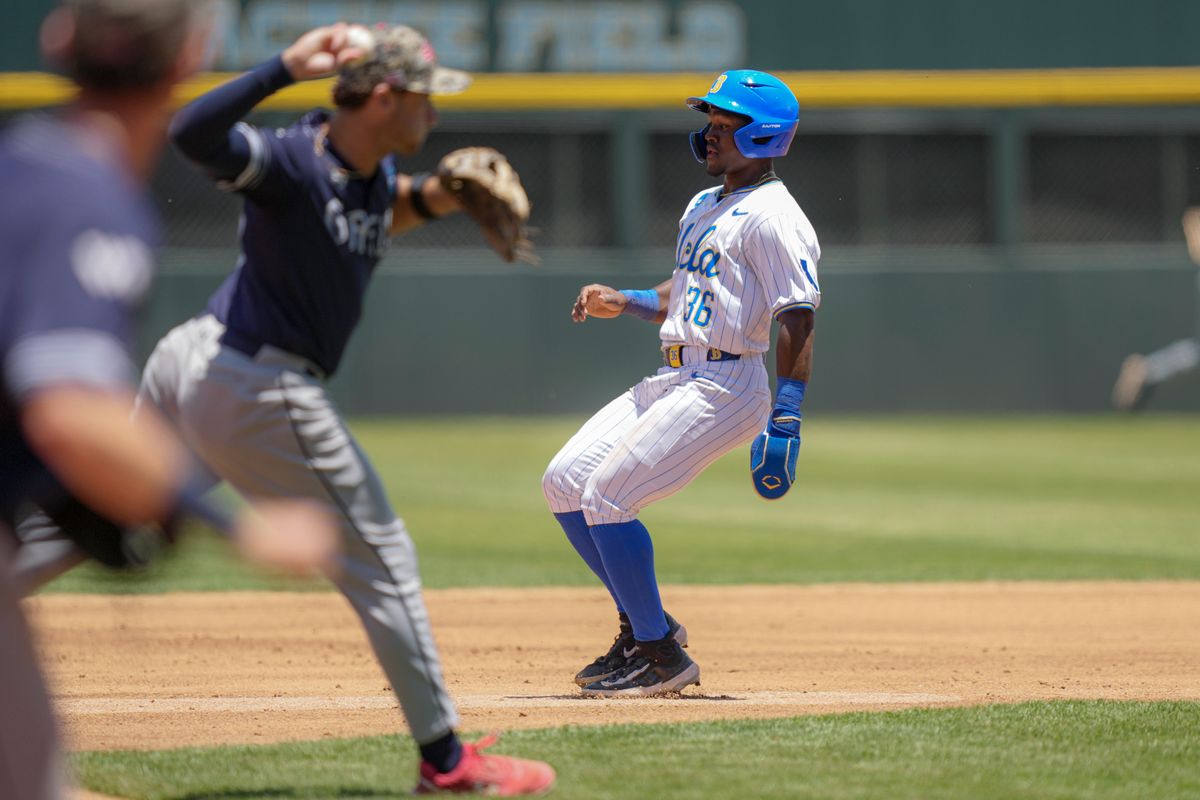 UCLA outfielder Dean West (36) stuck between bases during a NCAA baseball game against Saint Mary’s on May 29, 2026 at Jackie Robinson Stadium in Los Angeles, CA. UCLA outfielder Dean West (36) stuck between bases during a NCAA baseball game against Saint Mary’s on May 29, 2026 at Jackie Robinson Stadium in Los Angeles, CA.