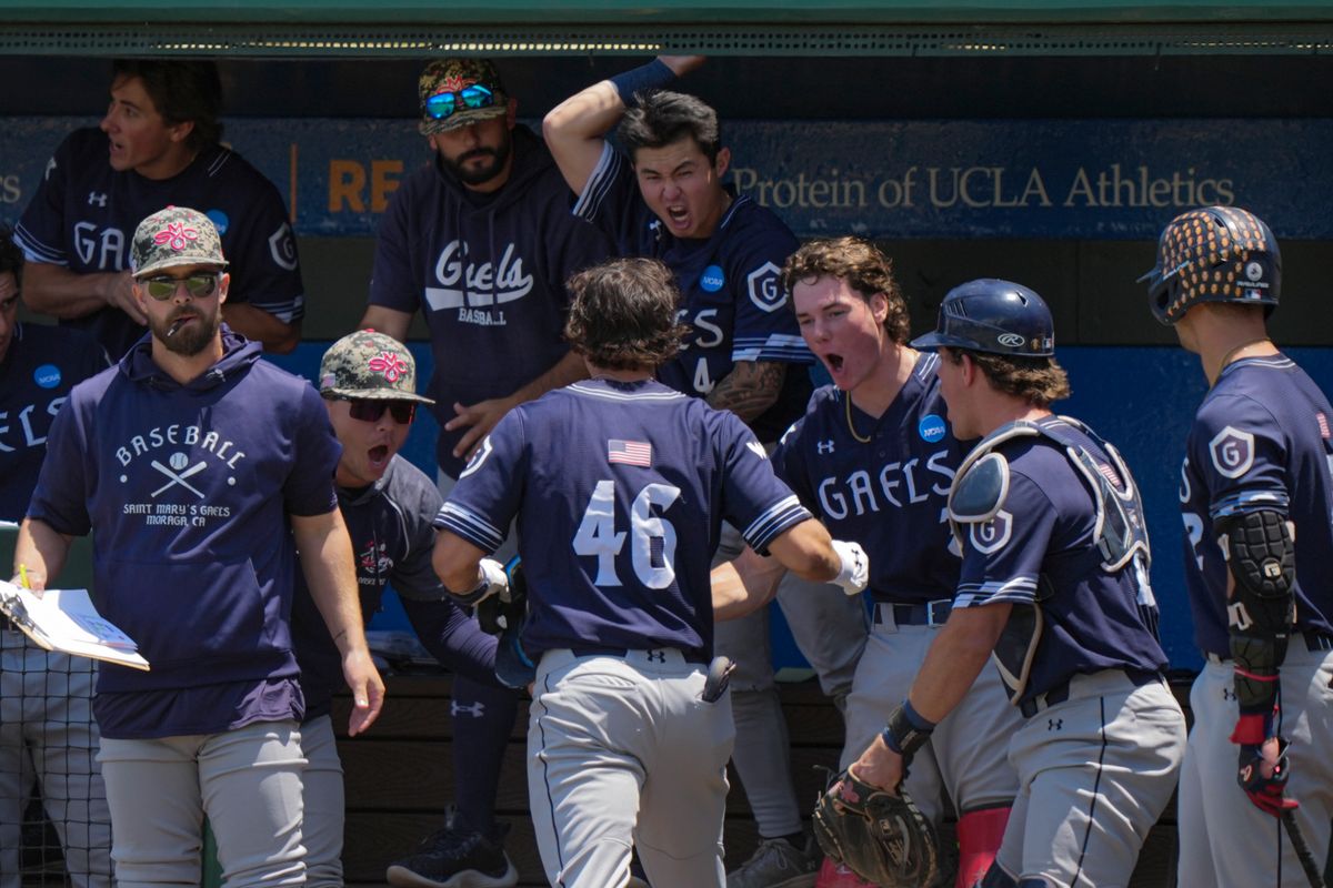 Saint Mary’s infielder Jacob Johnson (46) celebrating with teammates after hitting a homer during a NCAA baseball game against UCLA on May 29, 2026 at Jackie Robinson Stadium in Los Angeles, CA. Saint Mary’s infielder Jacob Johnson (46) celebrating with teammates after hitting a homer during a NCAA baseball game against UCLA on May 29, 2026 at Jackie Robinson Stadium in Los Angeles, CA.