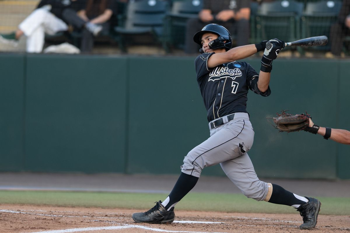 Cal Poly Mustangs infielder Nate Castellon (7) swings and misses during an NCAA regional championship elimination game between the Saint Mary's College Gaels and Cal Poly Mustangs on May 31, 2026 at Jackie Robinson Stadium in Los Angeles Calif.