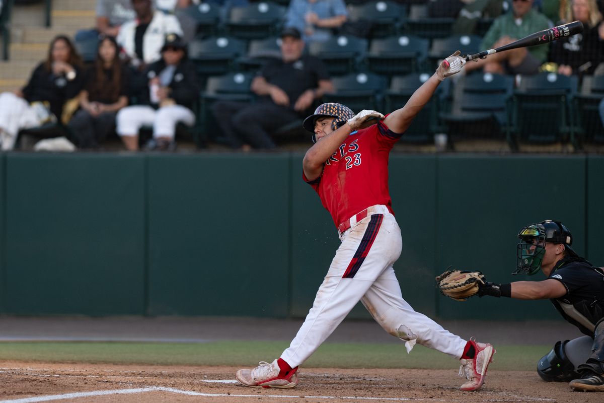 Saint Mary's College infielder Makoa Sniffen (23) swings and misses during an NCAA regional championship elimination game between the Saint Mary's College Gaels and Cal Poly Mustangs on May 31, 2026 at Jackie Robinson Stadium in Los Angeles Calif.