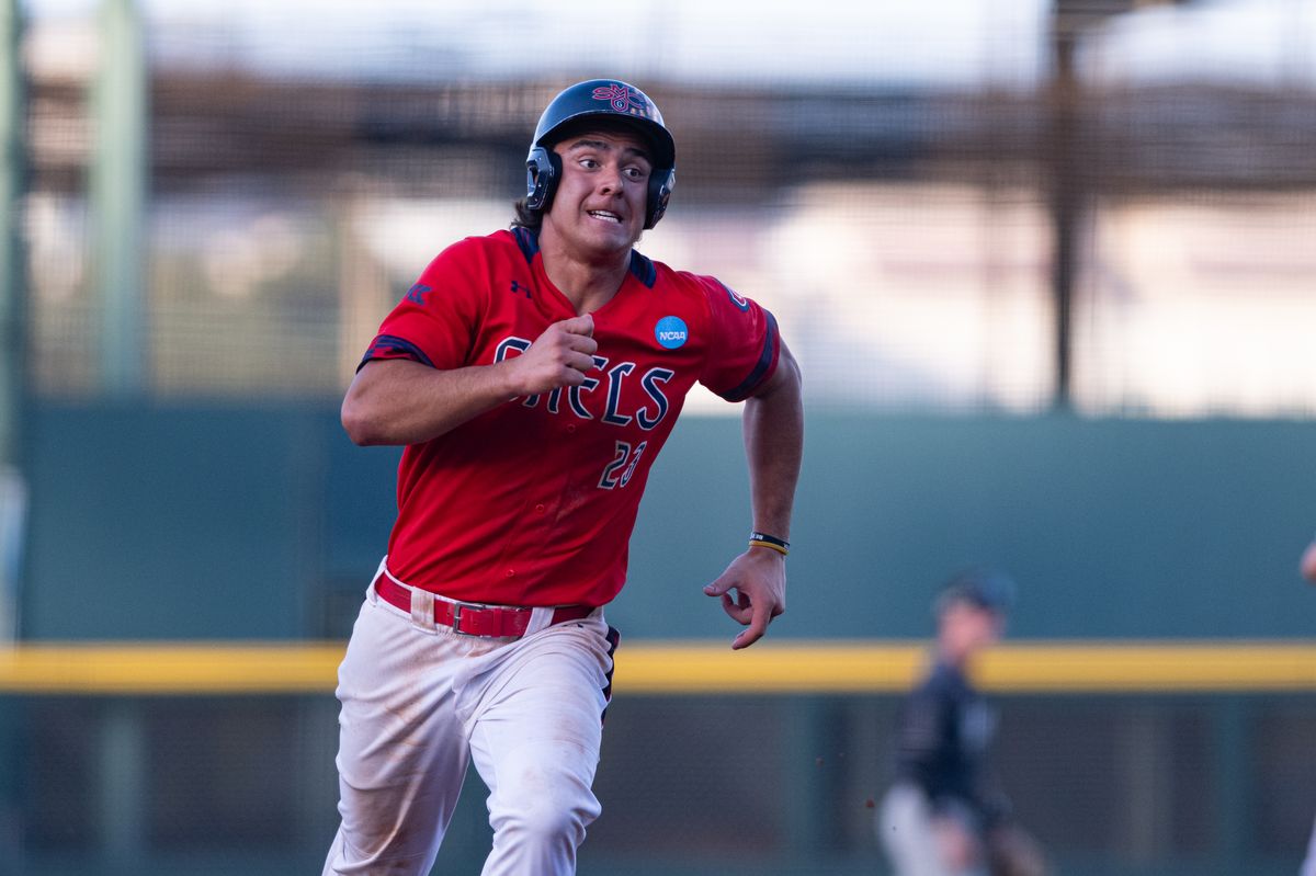 Saint Mary's College infielder Makoa Sniffen (23) runs to third base during an NCAA regional championship elimination game between the Saint Mary's College Gaels and Cal Poly Mustangs on May 31, 2026 at Jackie Robinson Stadium in Los Angeles Calif.