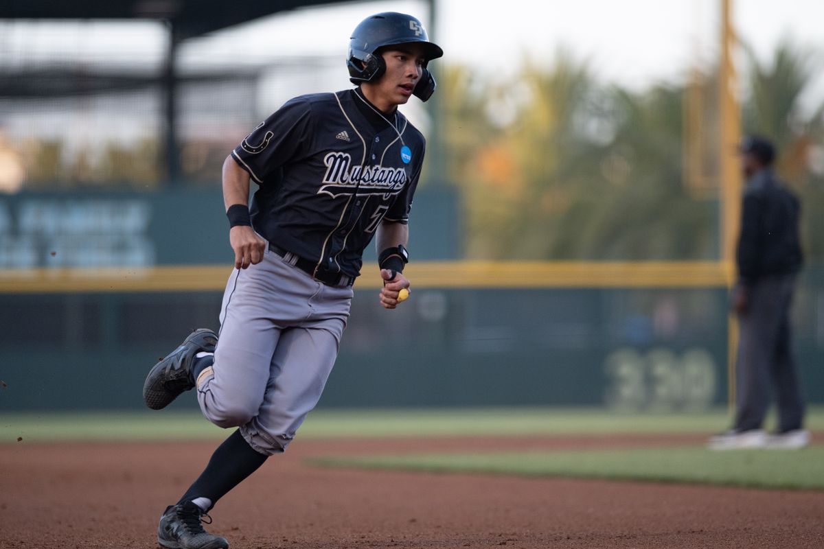 Cal Poly Mustangs infielder Nate Castellon (7) runs to home plate during an NCAA regional championship elimination game between the Saint Mary's College Gaels and Cal Poly Mustangs on May 31, 2026 at Jackie Robinson Stadium in Los Angeles Calif.