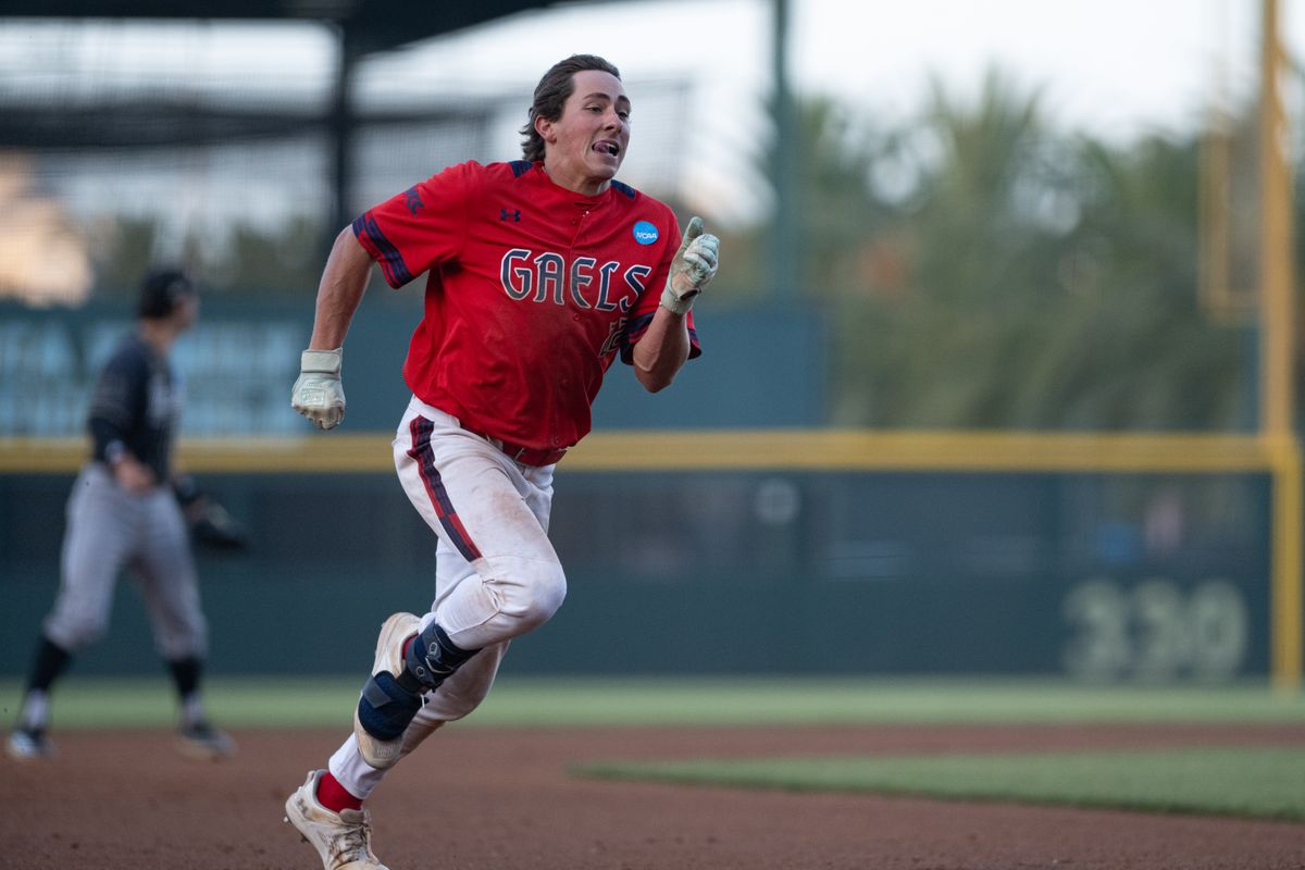 Saint Mary's College outfielder Tanner Griffith (22) runs to third base during an NCAA regional championship elimination game between the Saint Mary's College Gaels and Cal Poly Mustangs on May 31, 2026 at Jackie Robinson Stadium in Los Angeles Calif.