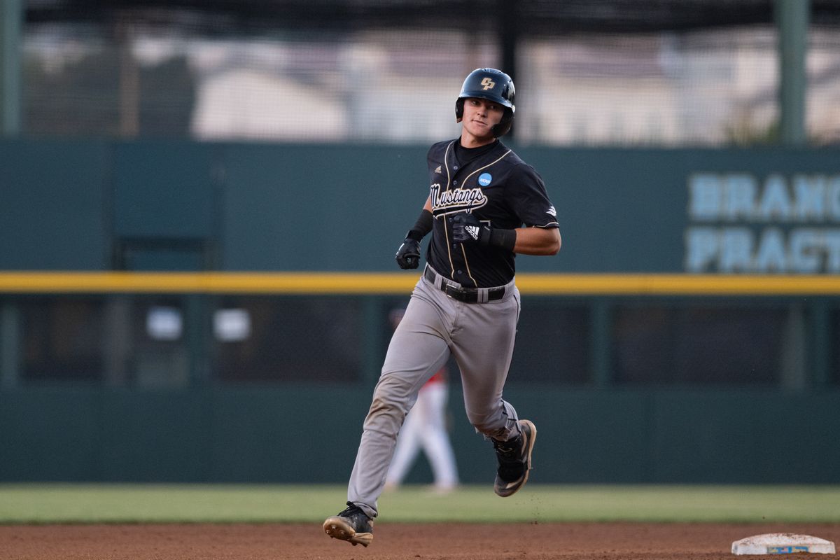 Cal Poly Mustangs catcher Ryan Tayman (16) runs after hitting a homerun during an NCAA regional championship elimination game between the Saint Mary's College Gaels and Cal Poly Mustangs on May 31, 2026 at Jackie Robinson Stadium in Los Angeles Calif.