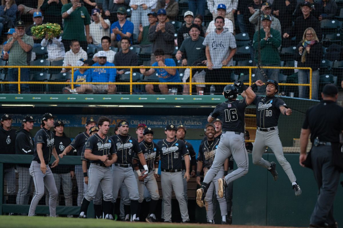Cal Poly Mustangs catcher Ryan Tayman (16) celebrates with teammates after hitting a homerun during an NCAA regional championship elimination game between the Saint Mary's College Gaels and Cal Poly Mustangs on May 31, 2026 at Jackie Robinson Stadium in Los Angeles Calif.