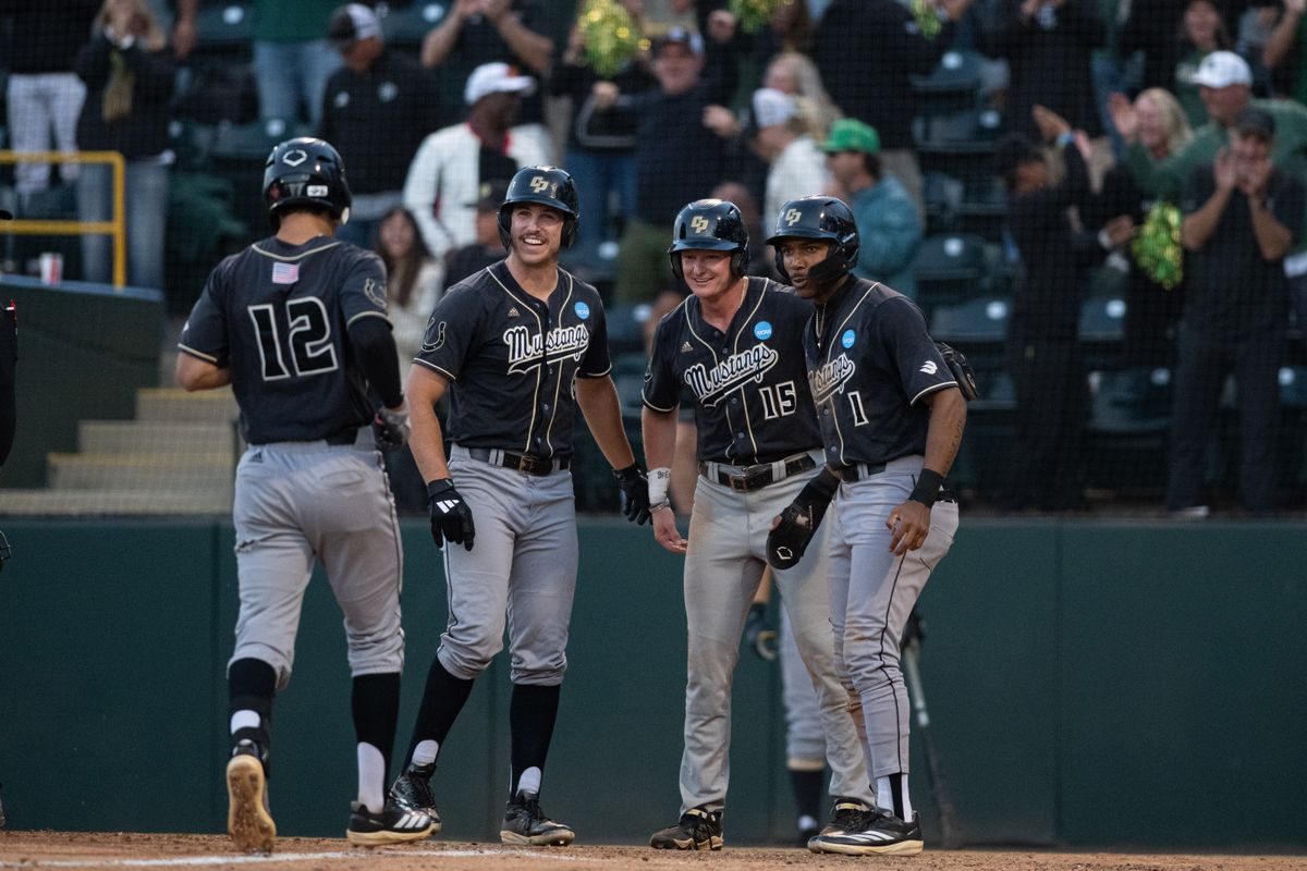 Cal Poly Mustangs celebrate after a 3 run inning during an NCAA regional championship elimination game between the Saint Mary's College Gaels and Cal Poly Mustangs on May 31, 2026 at Jackie Robinson Stadium in Los Angeles Calif.