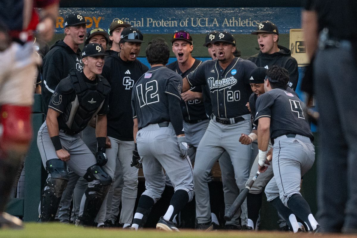 Cal Poly Mustangs celebrate after a 3 run inning during an NCAA regional championship elimination game between the Saint Mary's College Gaels and Cal Poly Mustangs on May 31, 2026 at Jackie Robinson Stadium in Los Angeles Calif.