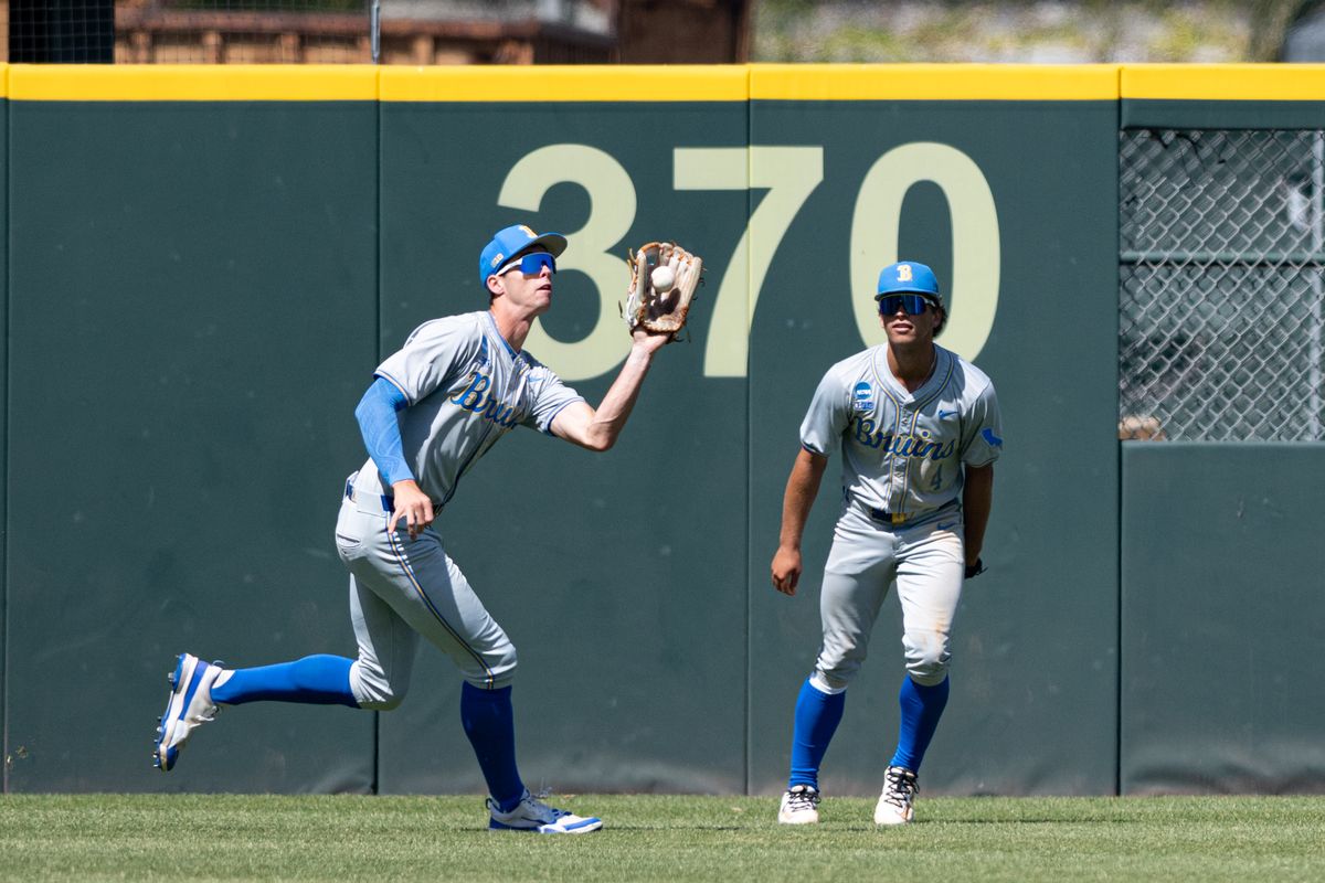 UCLA Bruins outfielder Will Gasparino (9) makes a catch during an NCAA regional championship elimination game between the Saint Mary's College Gaels and UCLA Bruins on May 31, 2026 at Jackie Robinson Stadium in Los Angeles Calif.