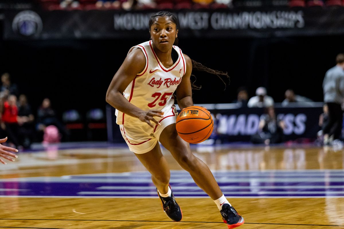 UNLV Lady Rebels guard Aaliyah Alexander (25) dribbles the ball towards the basket during a Mountain West Tournament semifinal game between UNLV Lady Rebels and the Colorado State Rams, Monday March 9, 2026 in Las Vegas, Nev.
