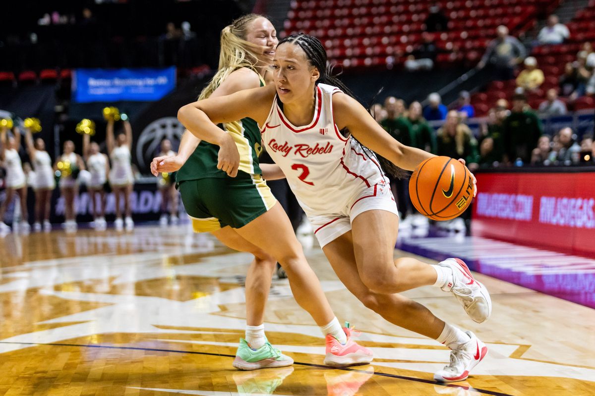 UNLV Lady Rebels guard Mariah Elohim (2) dribbles the ball towards the basket during a Mountain West Tournament semifinal game between UNLV Lady Rebels and the Colorado State Rams, Monday March 9, 2026 in Las Vegas, Nev.