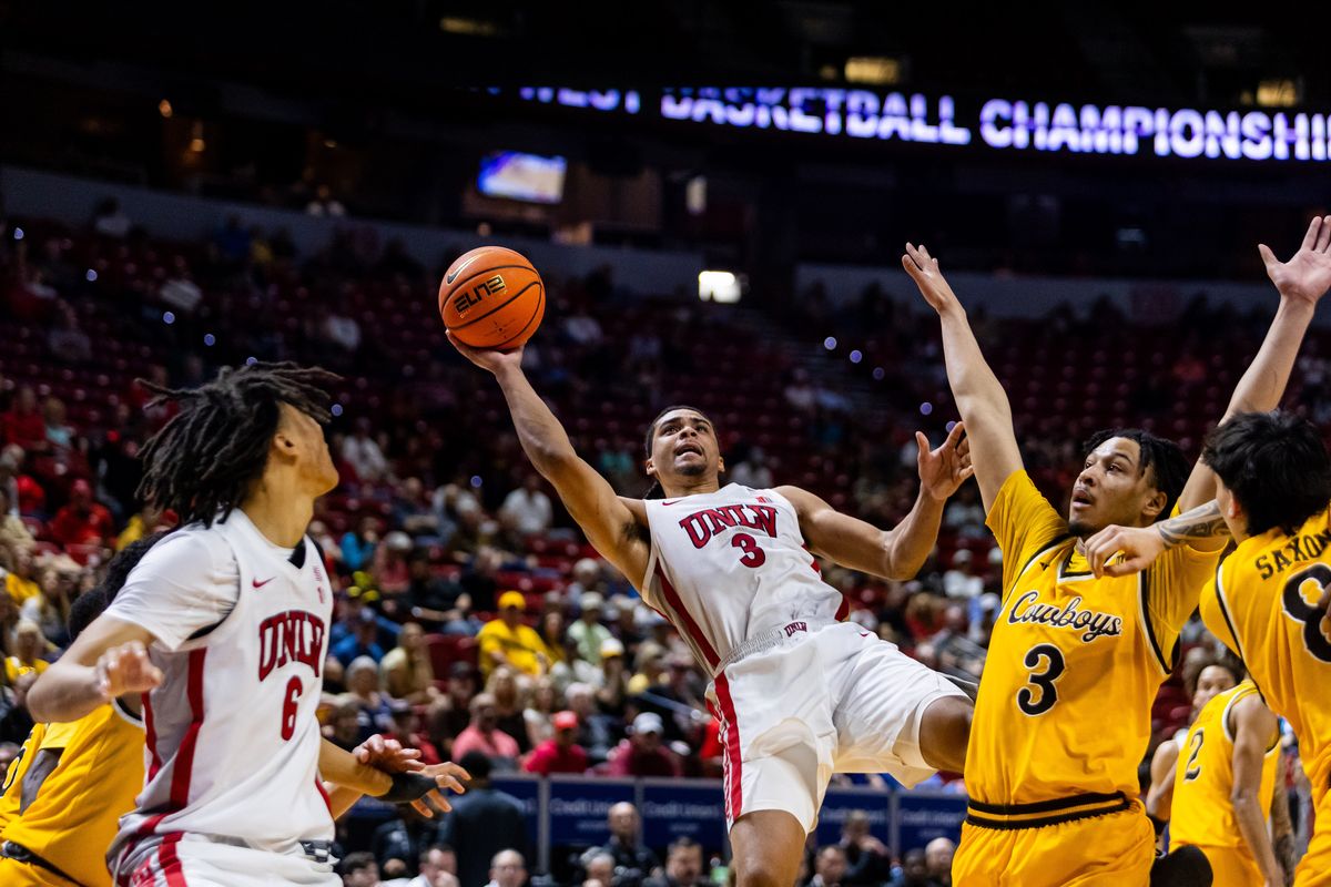 UNLV Runnin’ Rebels guard Howie Flemming Jr. (3) shoots a fadeaway shot during the first round of a Mountain West Championship tournament game between the UNLV Runnin’ Rebels and the Wyoming Cowboys, Wednesday March 11, 2026 in Las Vegas, Nev.