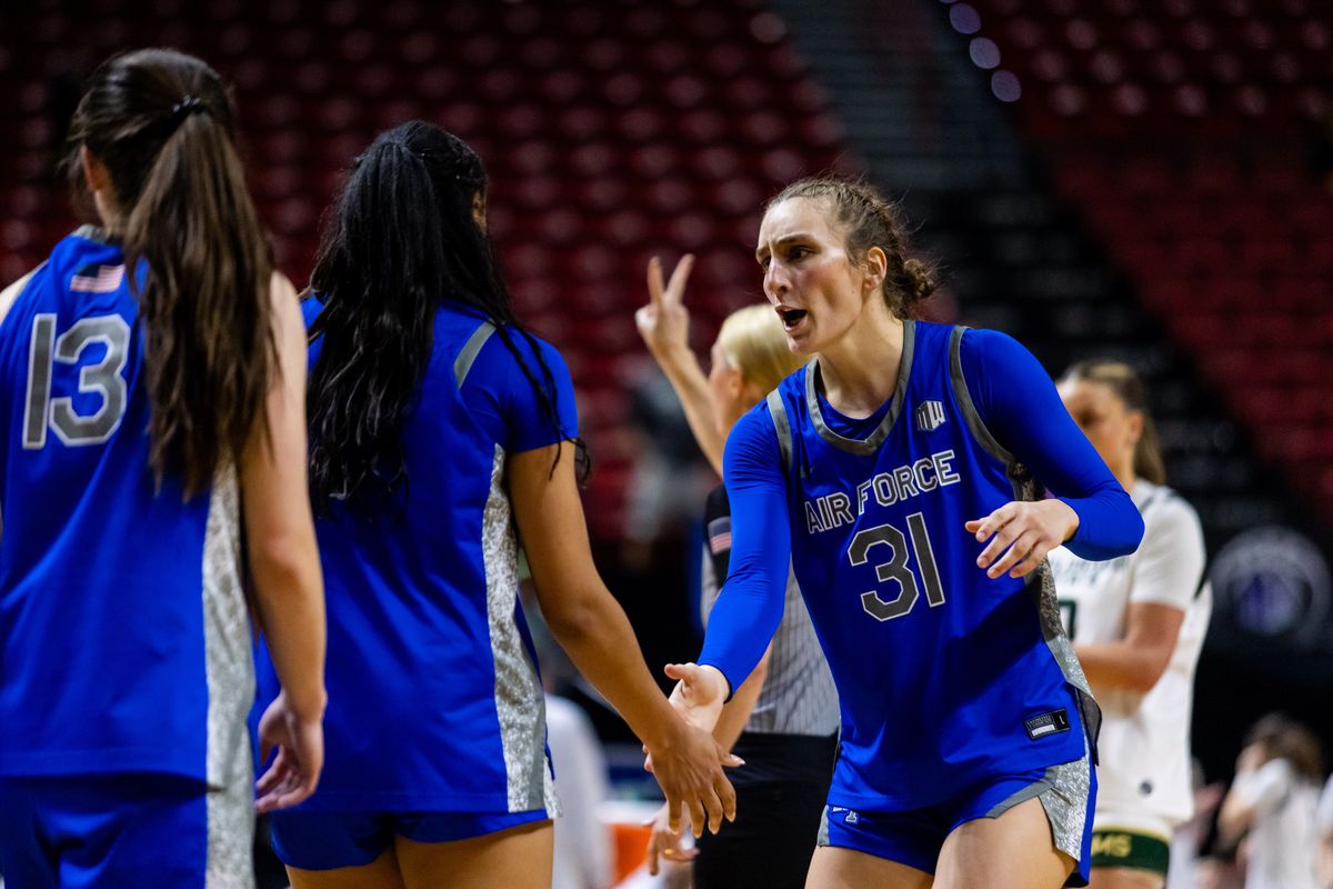 Air Force forward Emily Adams (31) high-fives teammates during a Mountain West Tournament championship game between Air Force  and the Colorado State Rams, Tuesday March 10, 2026 in Las Vegas, Nev.