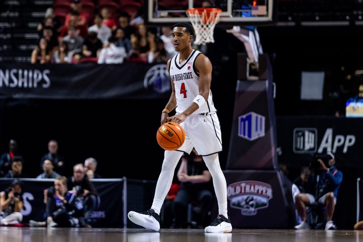 San Diego Aztecs guard Sean Newman Jr. (4) dribbles the ball up the court during a Mountain West Championship tournament quarterfinal game between the San Diego Aztecs and the Colorado State Rams, Thursday March 12, 2026 in Las Vegas, Nev.