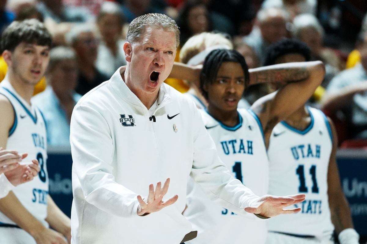 Utah State coach Jerrod Calhoun coaches his team from the sideline during the second round of a Mountain West Championship tournament game between the UNLV and Utah State on Thursday March 12, 2026 in Las Vegas, Nev.