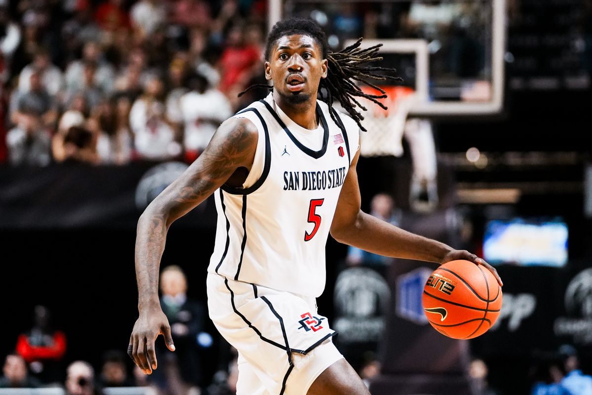 San Diego State forward Pharaoh Compton takes the ball down the court during the semifinal Mountain West Championship tournament game between San Diego State and New Mexico on Friday March 13, 2026 in Las Vegas, Nev.