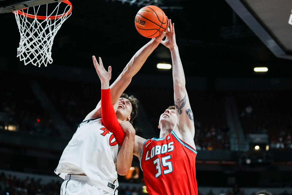 San Diego State forward Miles Heide (40) blocks a shot from New Mexico JT Rock (35) during the semifinal Mountain West Championship tournament game between San Diego State and New Mexico on Friday March 13, 2026 in Las Vegas, Nev.