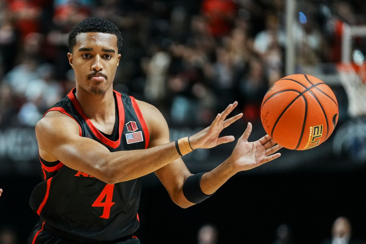 San Diego State guard Sean Newman Jr. (4) passes the ball during final Mountain West Championship tournament game between San Diego State and Utah State on Saturday March 14, 2026 in Las Vegas, Nev.