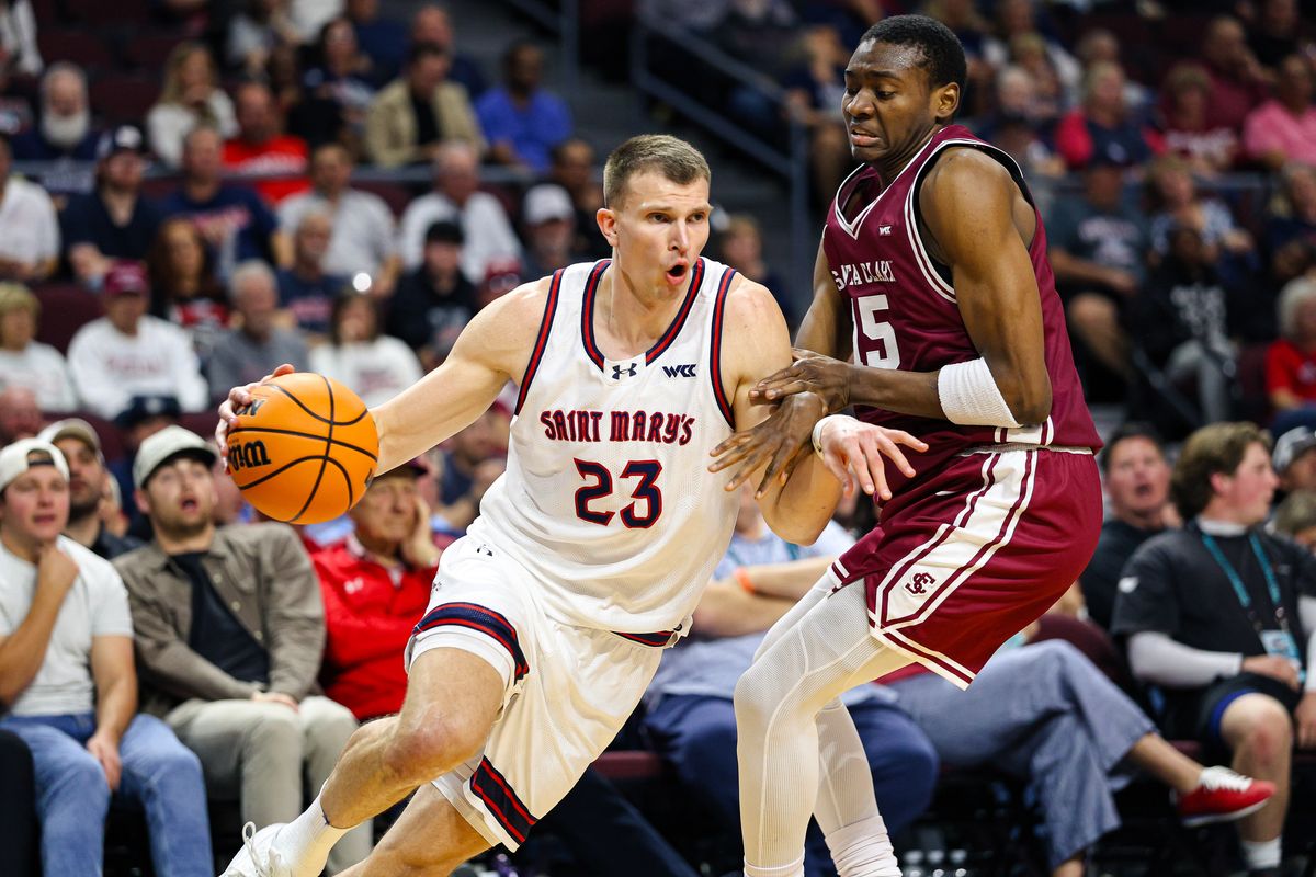 Saint Mary's Gaels F Paulius Murauskas (23) drives with the ball guarded by Santa Clara Broncos G Thierry Darlan (15) during the 2026 WCC Tournament Semi-Finals on Monday March 9, 2026, in Las Vegas, Nevada. 