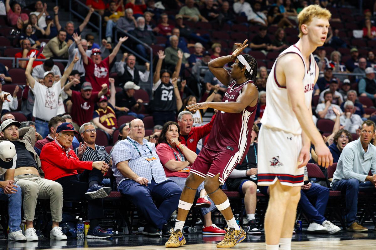 Santa Clara Broncos F Elijah Mahi (8) reacts with the crowd after he drained a late three-point shot against the Saint Mary's Gaels on Monday March 9, 2026, in Las Vegas, Nevada. 