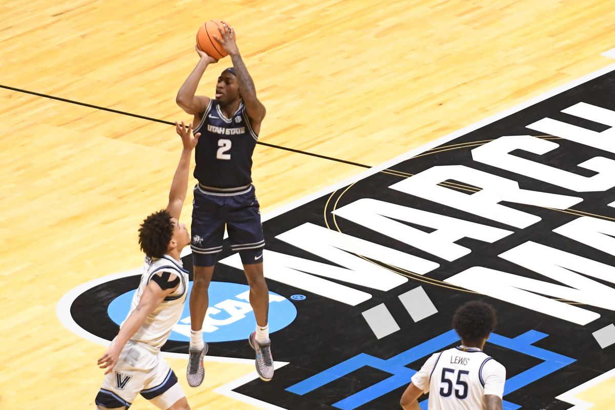 Utah State guard MJ Collins (2) takes a shot during an NCCA March Madness game against Villanova Friday March 20, 2026 in San Diego , California. Utah State guard MJ Collins (2) takes a shot during an NCCA March Madness game against Villanova Friday March 20, 2026 in San Diego , California.