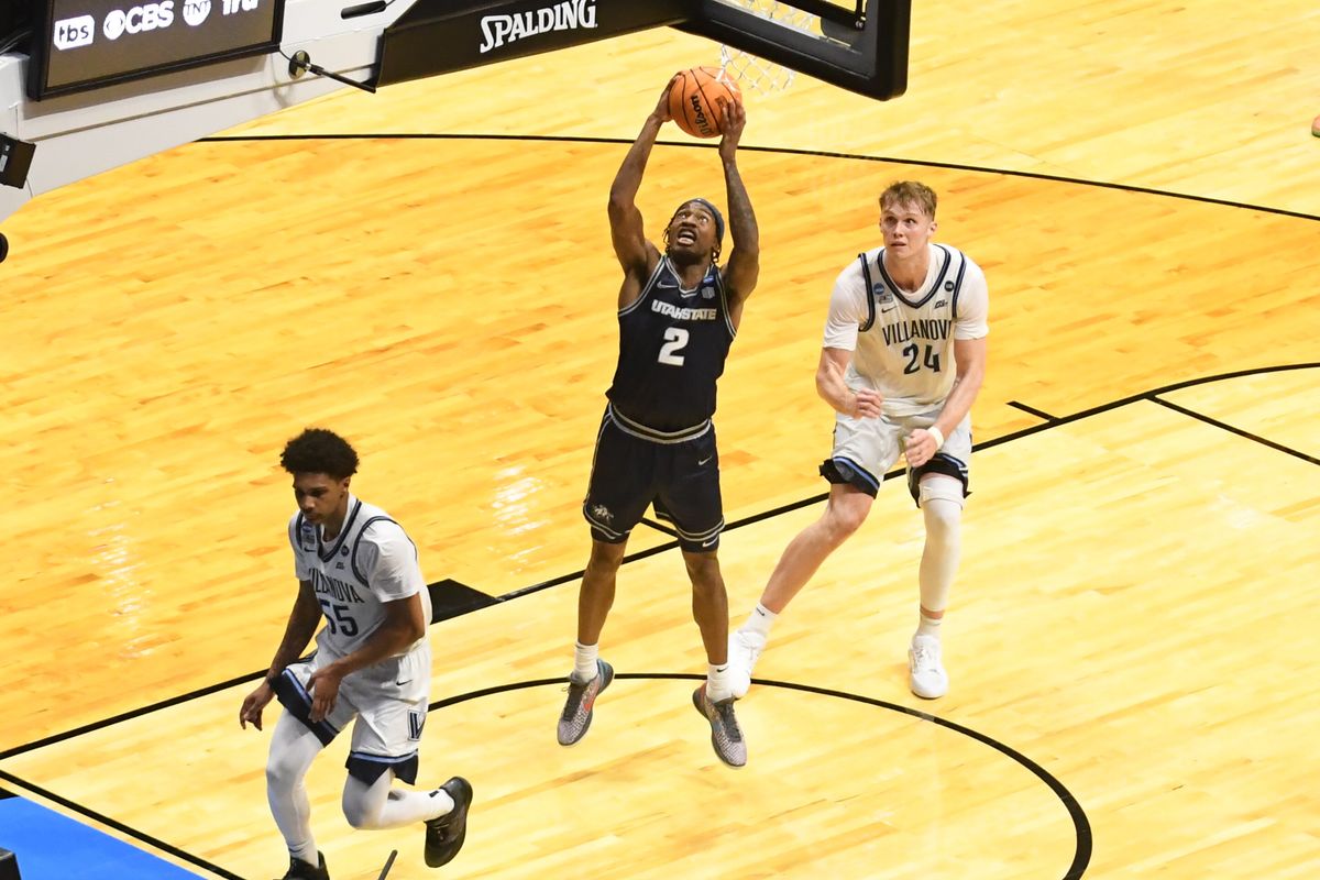 Utah State guard MJ Collins (2) shoots a shot during an NCCA March Madness game against Villanova Friday March 20, 2026 in San Diego , California. Utah State guard MJ Collins (2) shoots a shot during an NCCA March Madness game against Villanova Friday March 20, 2026 in San Diego , California.