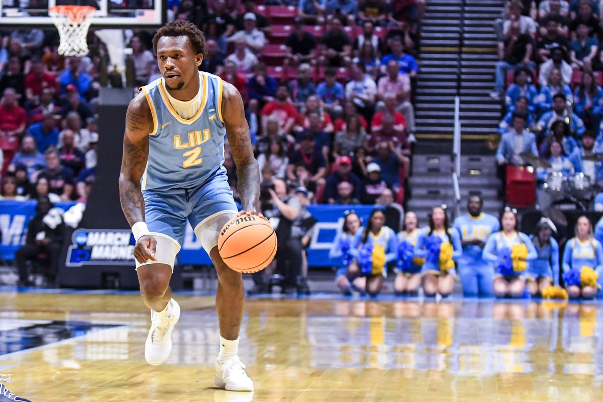 LIU Guard Greg Gordon (2) brings the ball up court during an NCCA March Madness game against  Arizona Friday March 20, 2026 in San Diego, California.