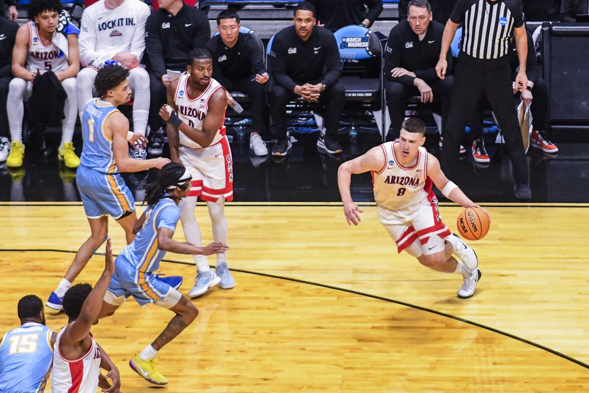 Arizona forward Ivan Kharchenkov (8) drives to the basket  during an NCCA March Madness game against  LIU Friday March 20, 2026 in San Diego, California.