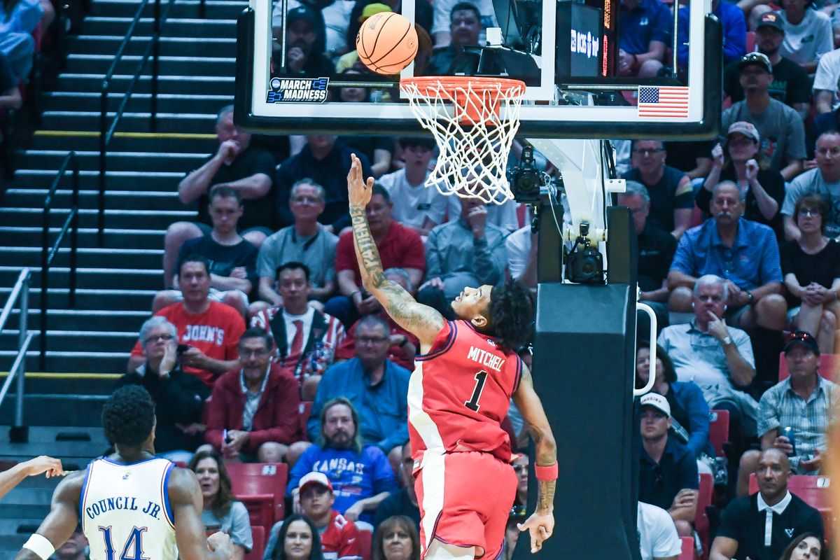 St. Johns forward Dillon Mitchell (1) makes a driving layup during an NCAA East Region second round game against  Kansas  Sunday March 22, 2026 in  San Diego, California.