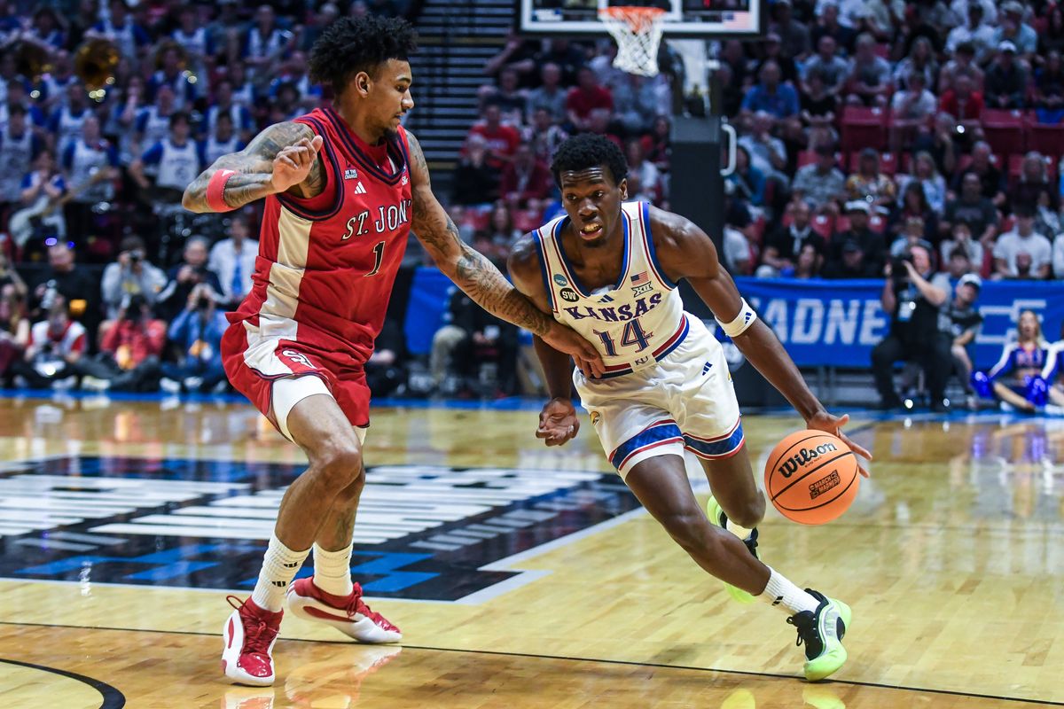 Kansas guard Melvin Council Jr. (14) dribbles the ball during an NCAA East Region second round game against  St. John’s   Sunday March 22, 2026 in  San Diego, California.