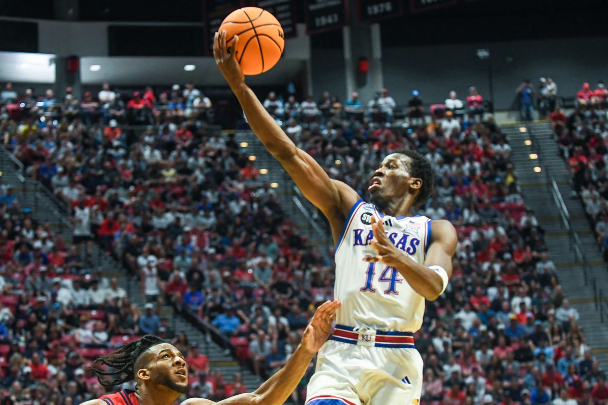 Kansas guard Melvin Council Jr. (14) makes a running layup during an NCAA East Region second round game against  St. John’s   Sunday March 22, 2026 in  San Diego, California.