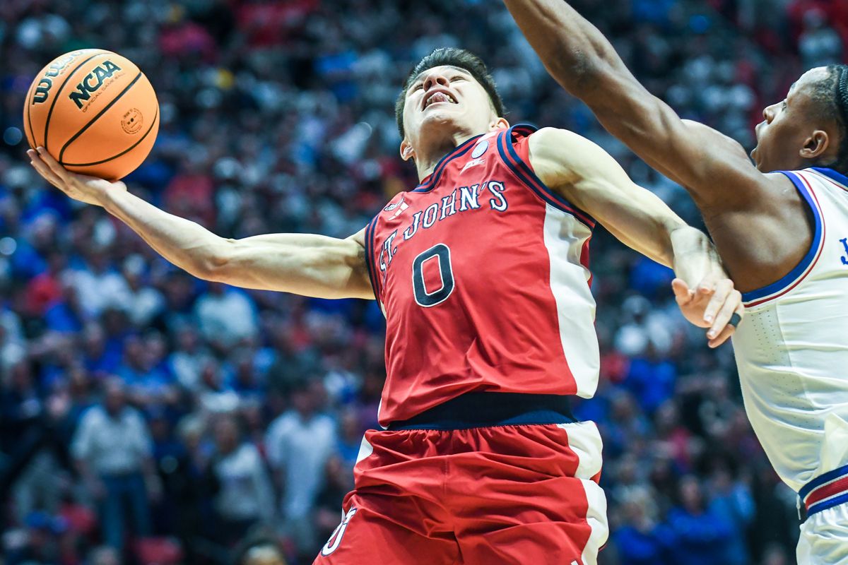 St. John’s guard Dylan Darling (0) makes the game winning shot during an NCAA East Region second round game against  Kansas  Sunday March 22, 2026 in  San Diego, California.