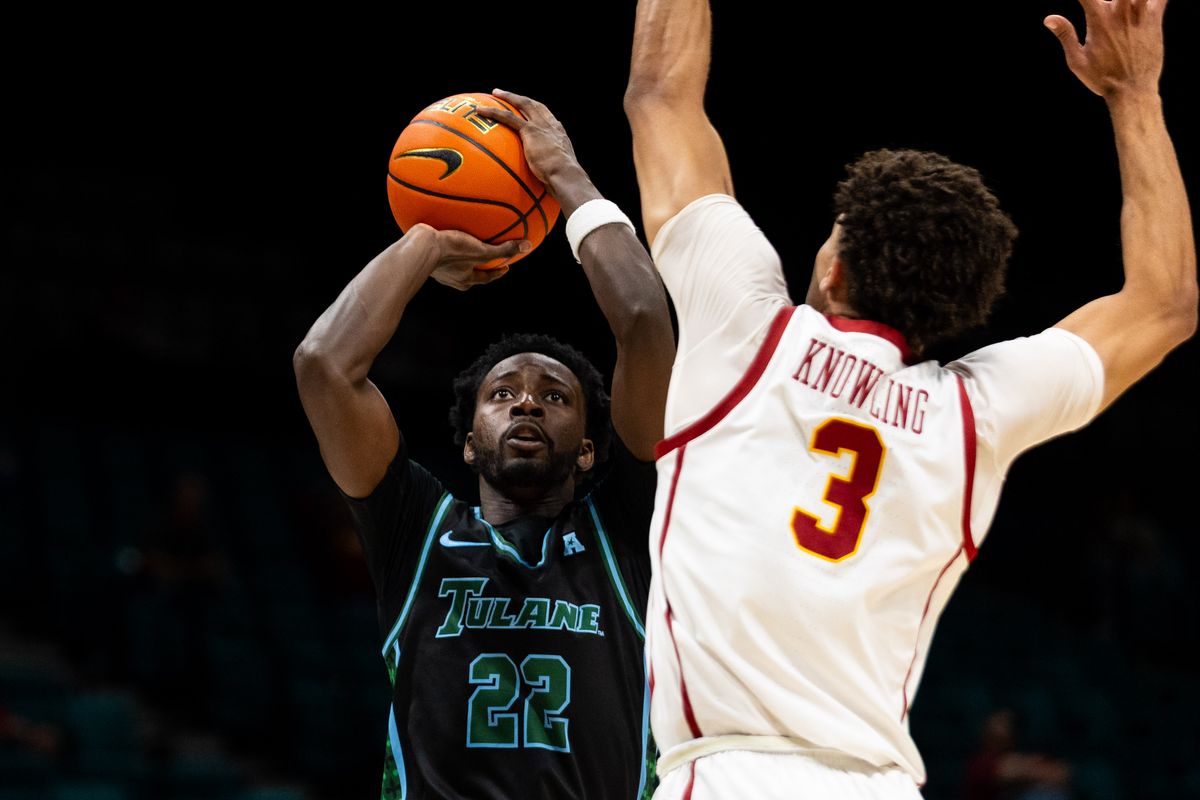 Tulane guard Asher Woods (22) shoots a contested jumpshot during a College Basketball Crown Tournament game between the USC Trojans and the Tulane Green Wave, Tuesday April 1, 2025 in Las Vegas, Nev.