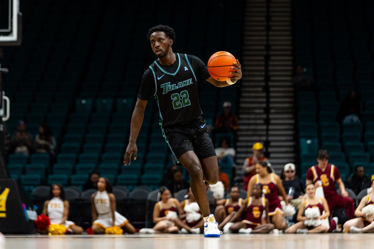 Tulane guard Asher Woods (22) dribbles the ball up the court during a College Basketball Crown Tournament game between the USC Trojans and the Tulane Green Wave, Tuesday April 1, 2025 in Las Vegas, Nev.