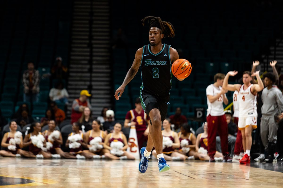 Tulane forward Gregg Glenn III (2) dribbles the ball up the court during a College Basketball Crown Tournament game between the USC Trojans and the Tulane Green Wave, Tuesday April 1, 2025 in Las Vegas, Nev.