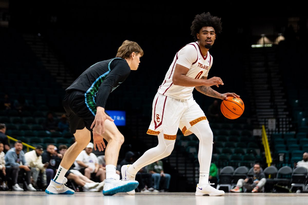 USC forward Saint Thomas (0) dribbles the ball up the court during a College Basketball Crown Tournament game between the USC Trojans and the Tulane Green Wave, Tuesday April 1, 2025 in Las Vegas, Nev.