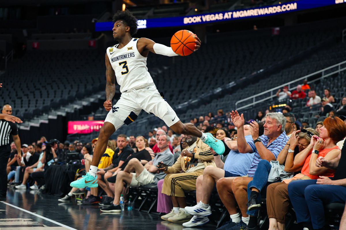 West Virginia Mountaineers G Honor Huff (3) jumps towards the crowd to collect the rebound during the 2026 College Basketball Crown Championship against the Oklahoma Sooners on Sunday, April 5, 2026, in Las Vegas, Nevada. West Virginia Mountaineers G Honor Huff (3) jumps towards the crowd to collect the rebound during the 2026 College Basketball Crown Championship against the Oklahoma Sooners on Sunday, April 5, 2026, in Las Vegas, Nevada.