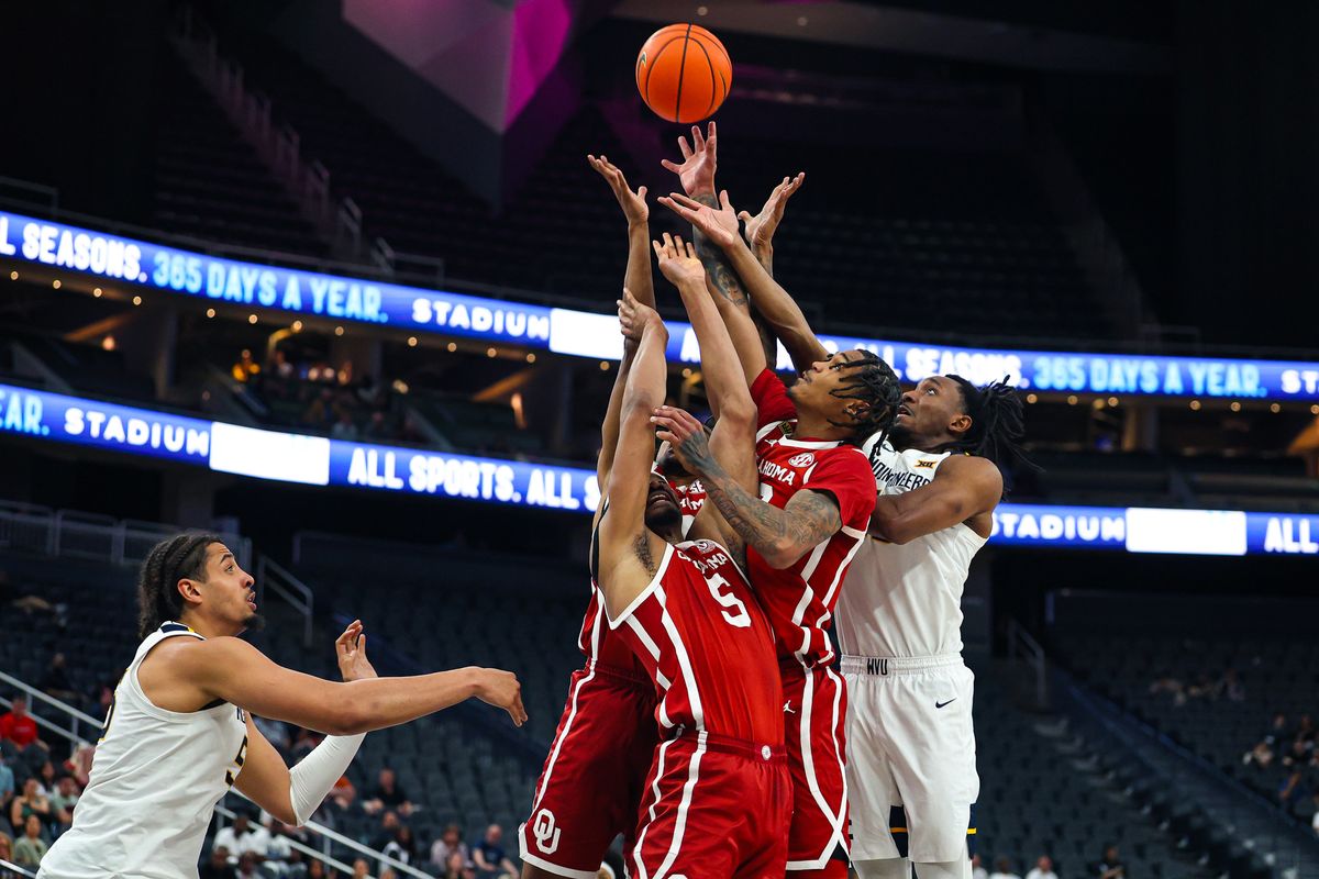 Multiple players for the West Virginia Mountaineers and Oklahoma Sooners jump for the rebound during the 2026 College Basketball Crown Championship on Sunday, April 5, 2026, in Las Vegas, Nevada. Multiple players for the West Virginia Mountaineers and Oklahoma Sooners jump for the rebound during the 2026 College Basketball Crown Championship on Sunday, April 5, 2026, in Las Vegas, Nevada.